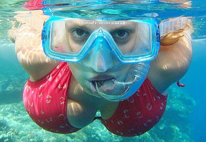 woman snorkeling underwater