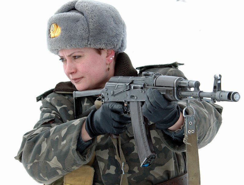 woman soldier with rifle