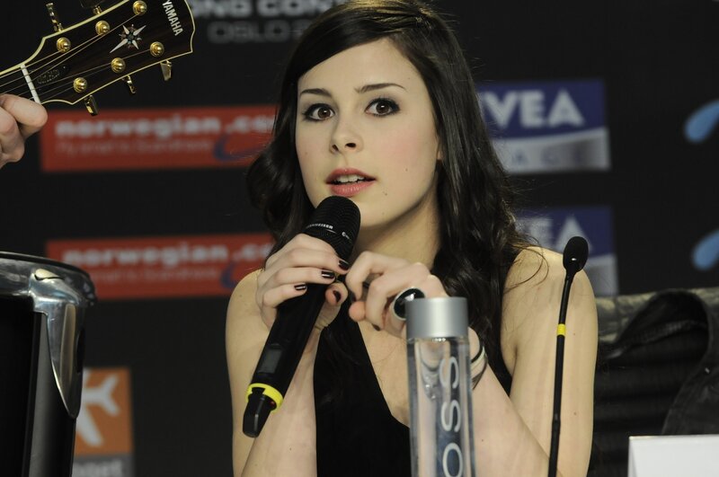 Woman speaking at a press event