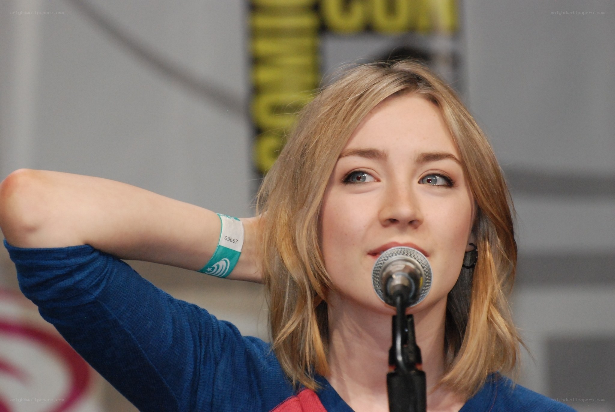 woman speaking at comic-con