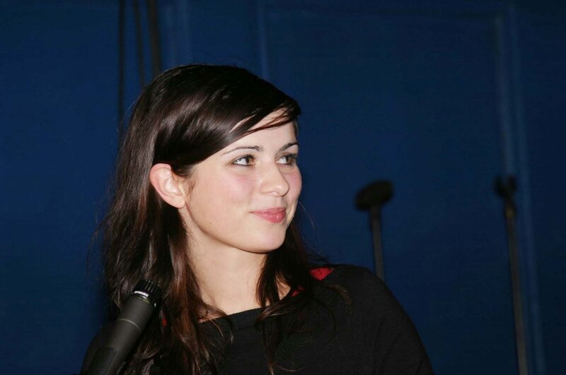 woman speaking at microphone