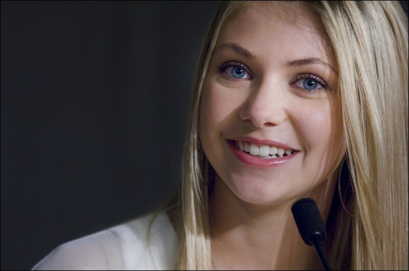 woman speaking at microphone