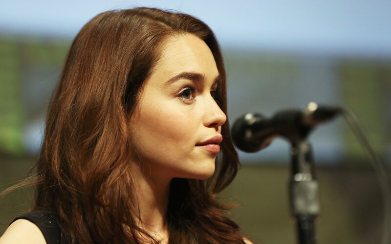 woman speaking at microphone