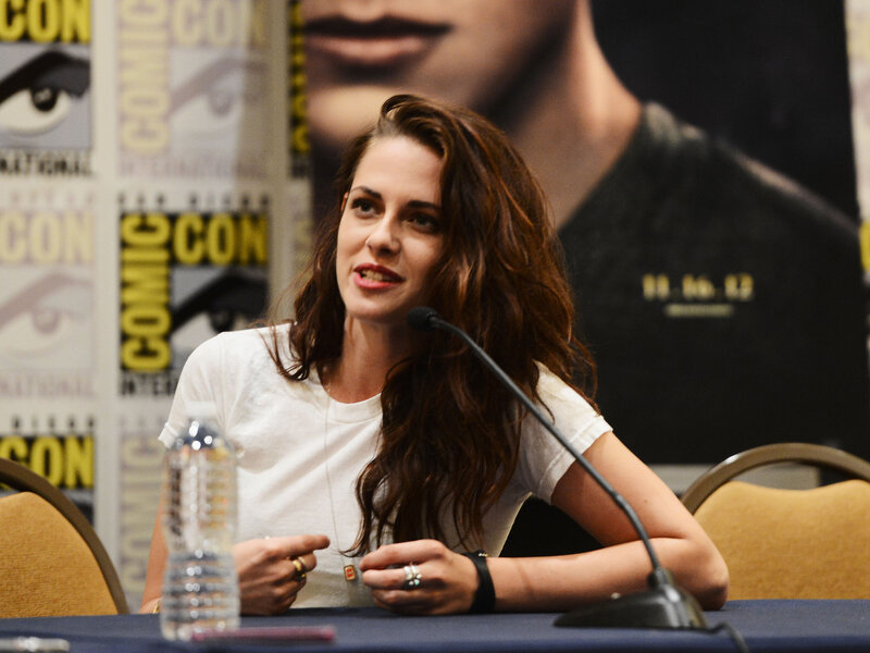 Woman Speaking at Panel — White