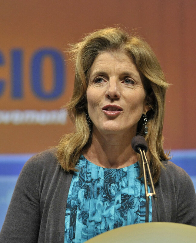 woman speaking at podium