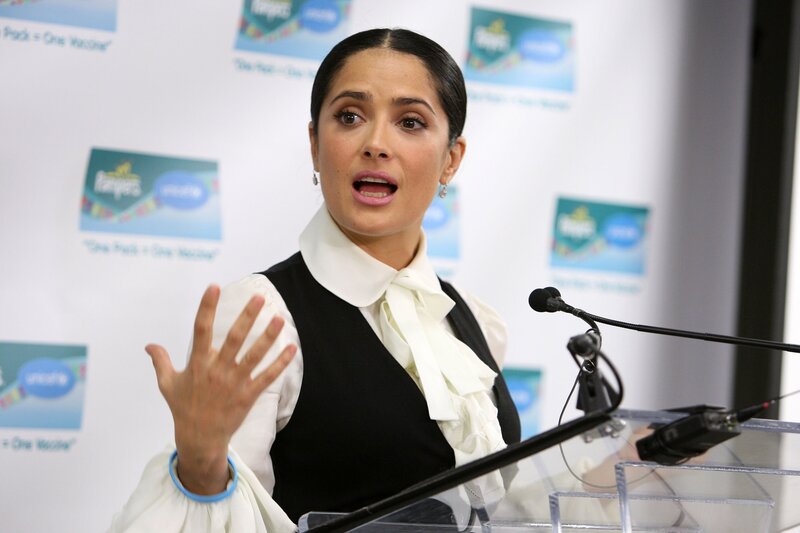 woman speaking at podium