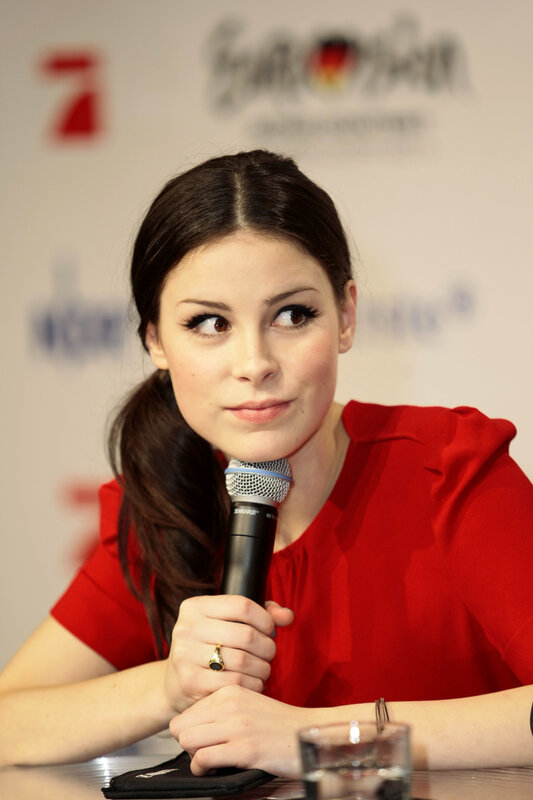 woman speaking at press event