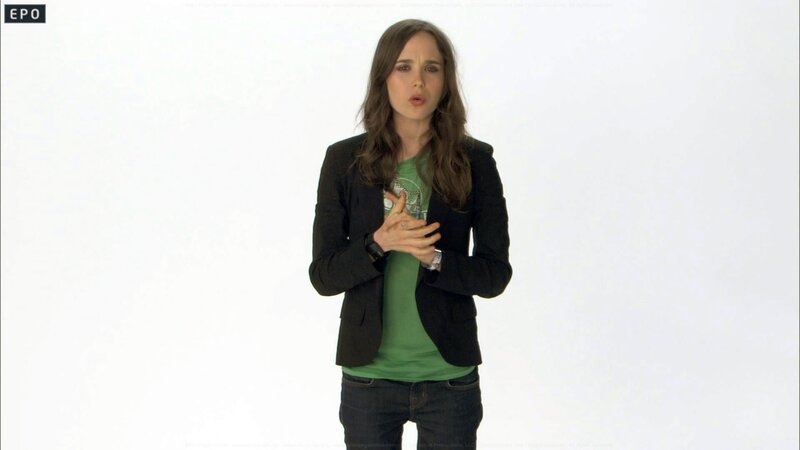 woman speaking in green shirt