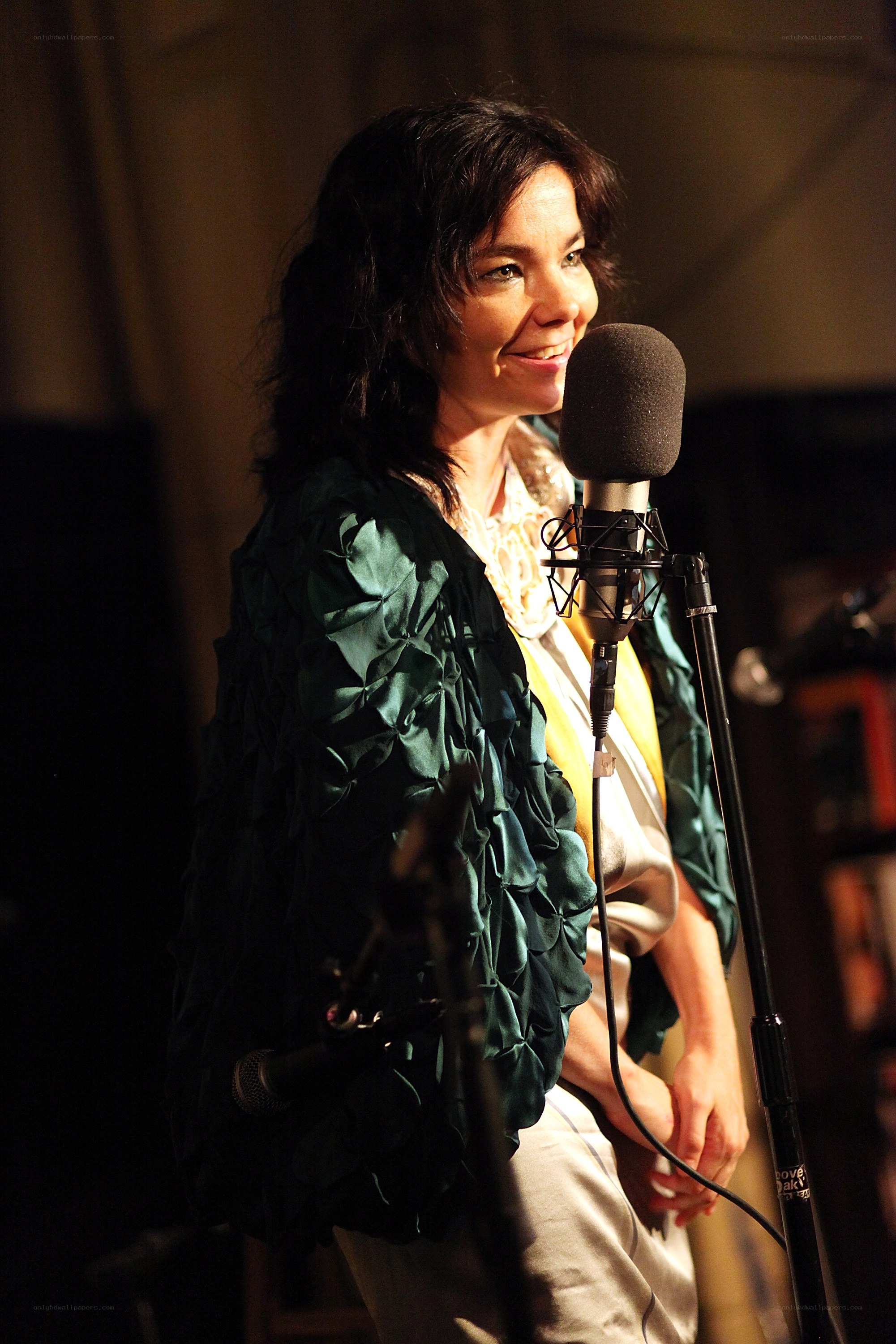 woman speaking into microphone