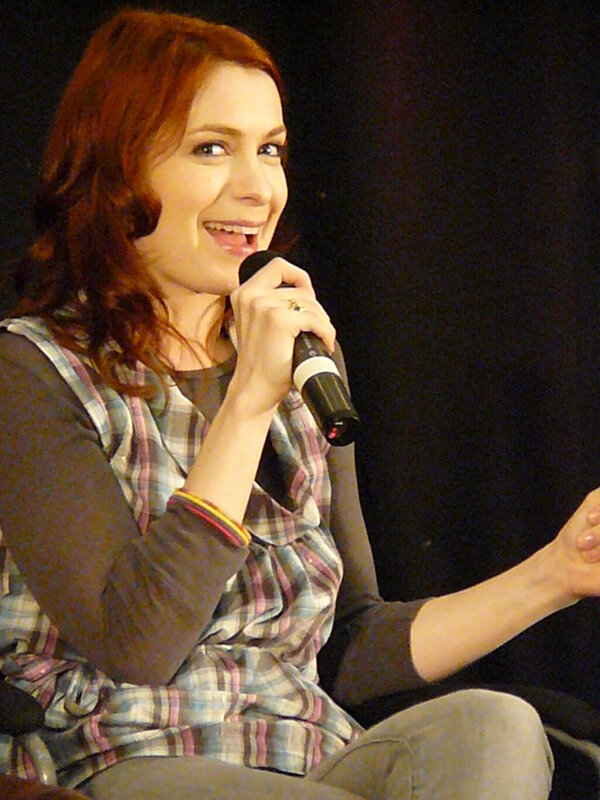 woman speaking into microphone