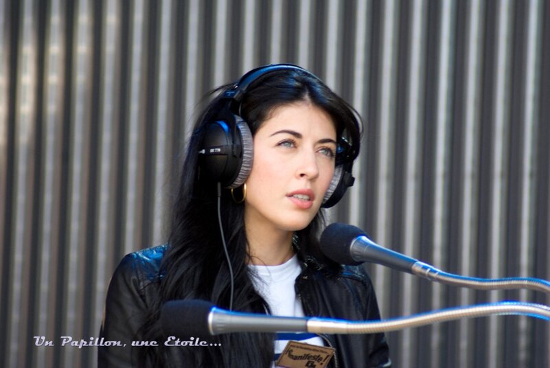 woman speaking into microphone