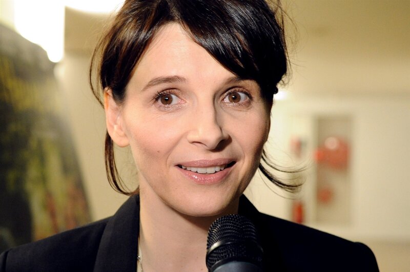 woman speaking into microphone