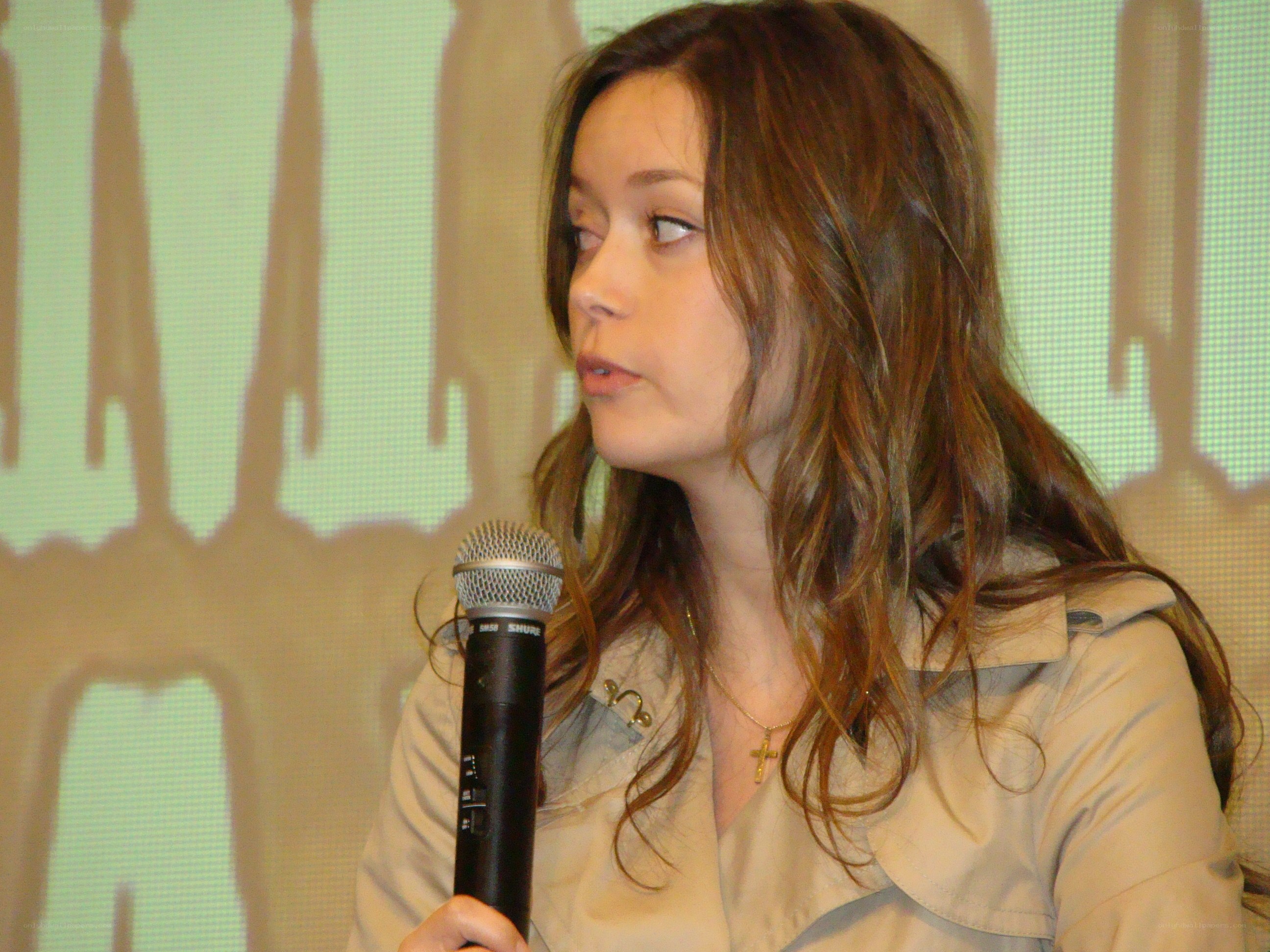 woman speaking into microphone