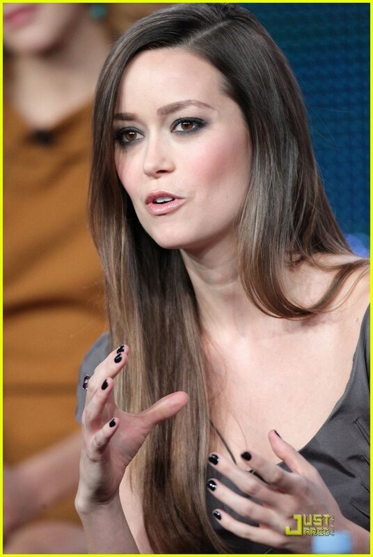 woman speaking on stage