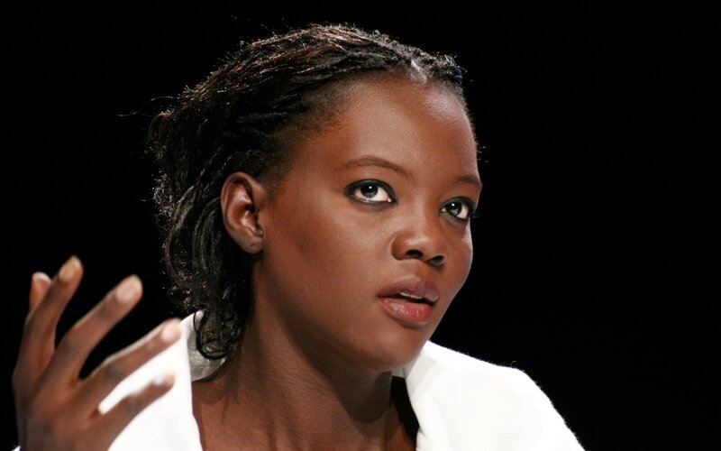 woman speaking on stage