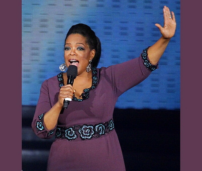 Woman Speaking on Stage — Purple