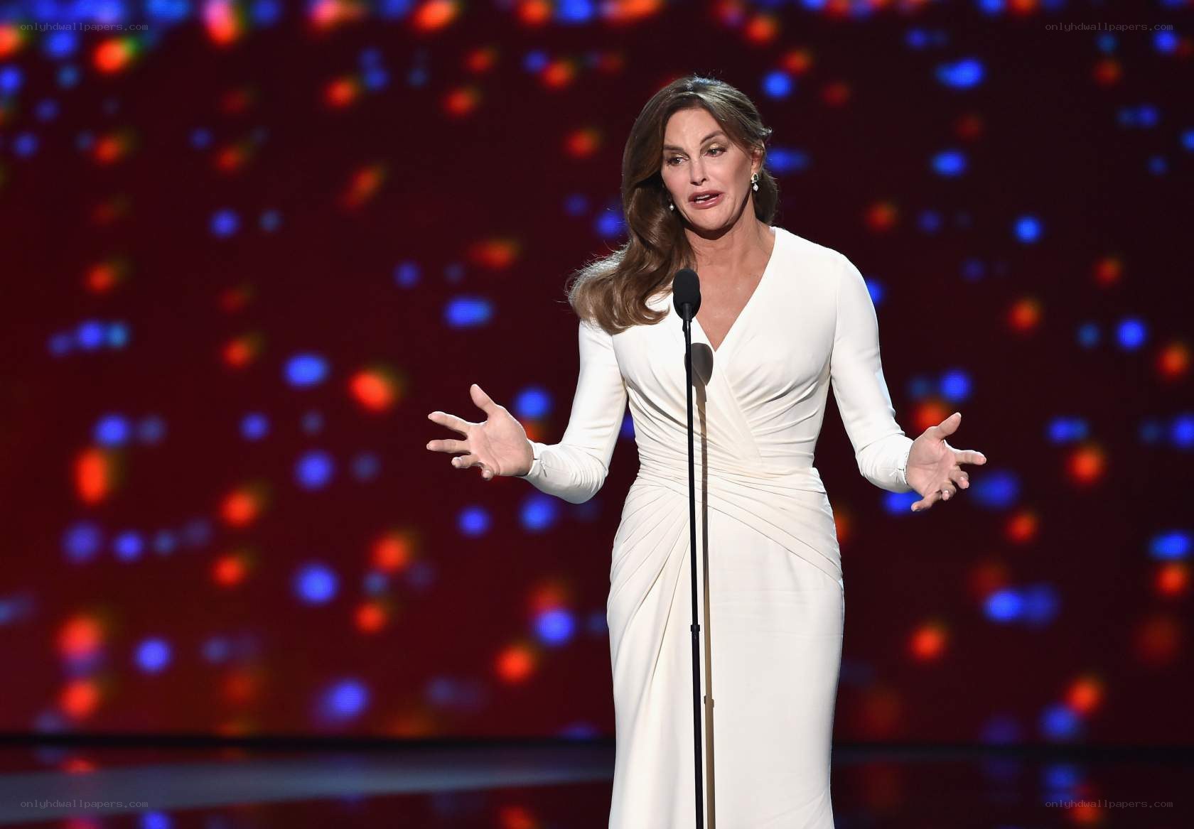 woman speaking on stage