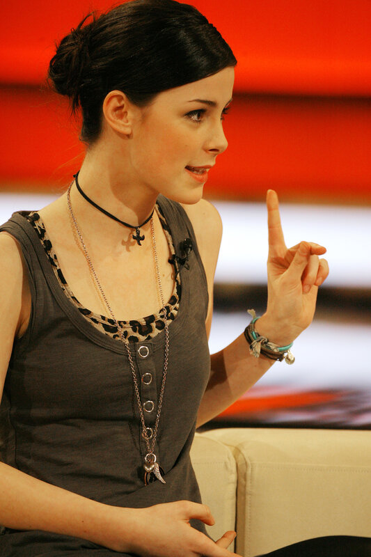 woman speaking on talk show
