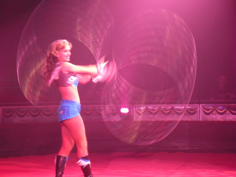 Woman Spinning Hoops