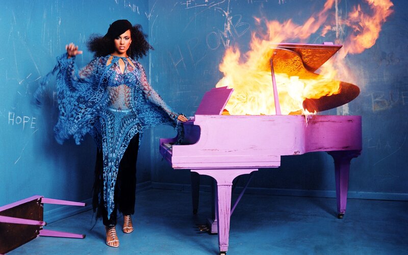 Woman Standing Beside Piano