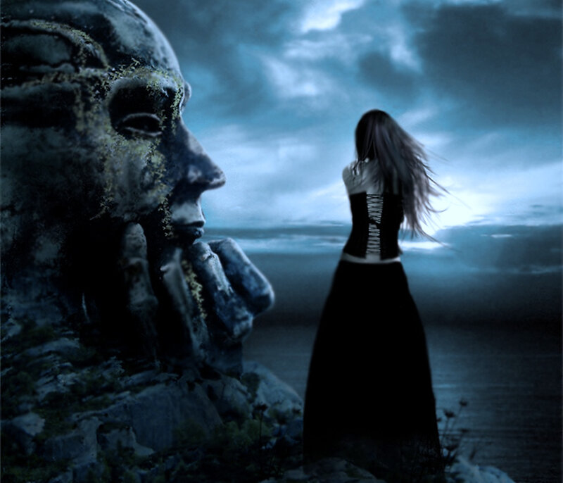 Woman Standing Beside Statue
