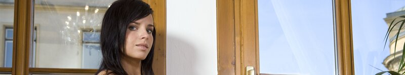 woman standing by a window