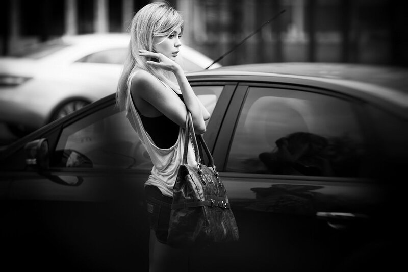 woman standing by car