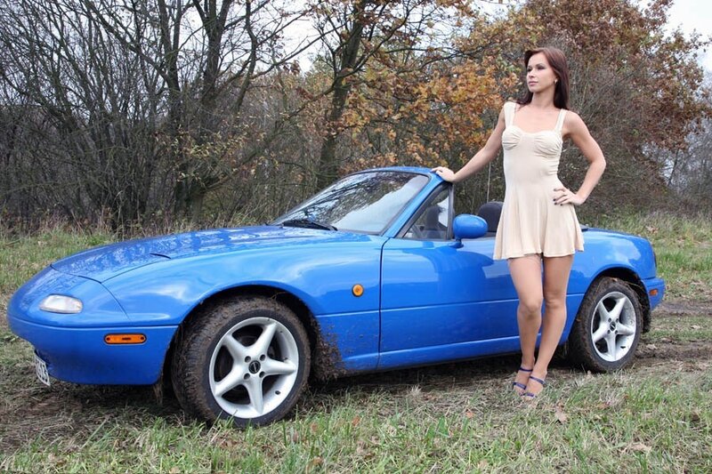 Woman Standing by Car — Blue, Calm