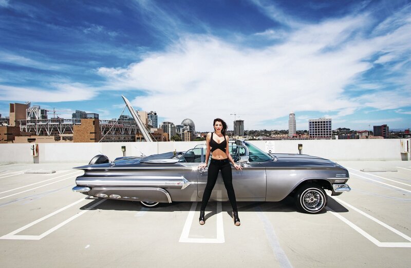 Woman Standing by Car — Blue, Dramatic, Afternoon