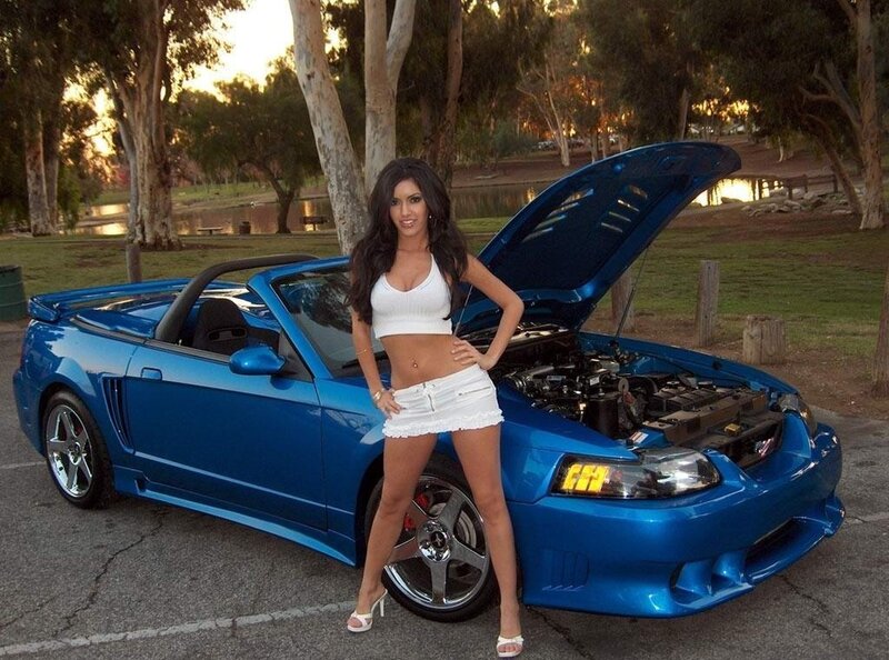 Woman Standing by Car — Blue, Relaxed, Sunset, Photograph, Trees