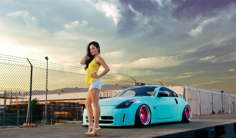 Woman Standing by Car — Cyan