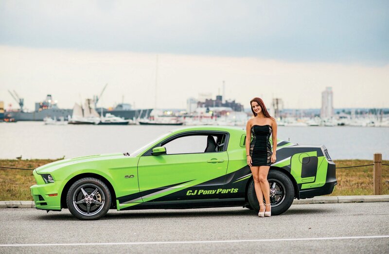 Woman Standing by Car — Green, Calm