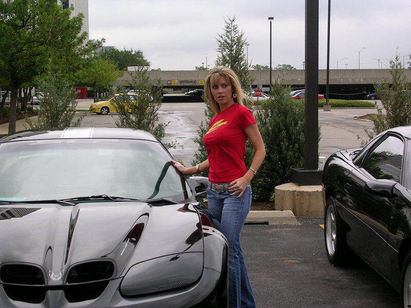 Woman Standing by Car — Red, Neutral