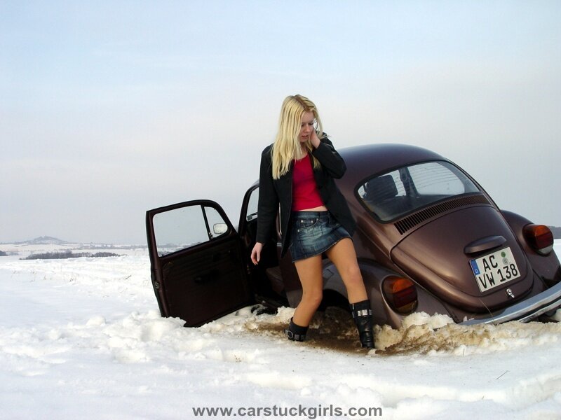 Woman Standing by Car — White, Cold
