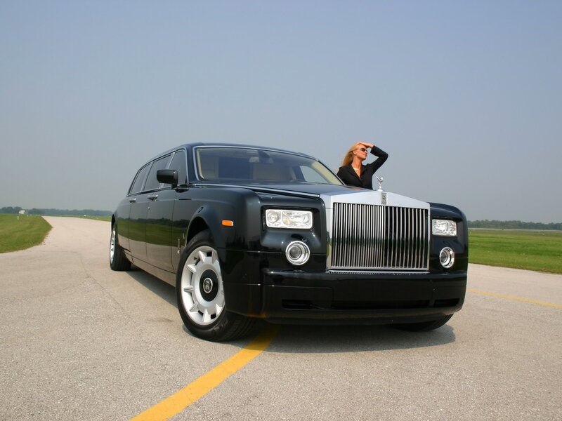 Woman Standing by Limousine