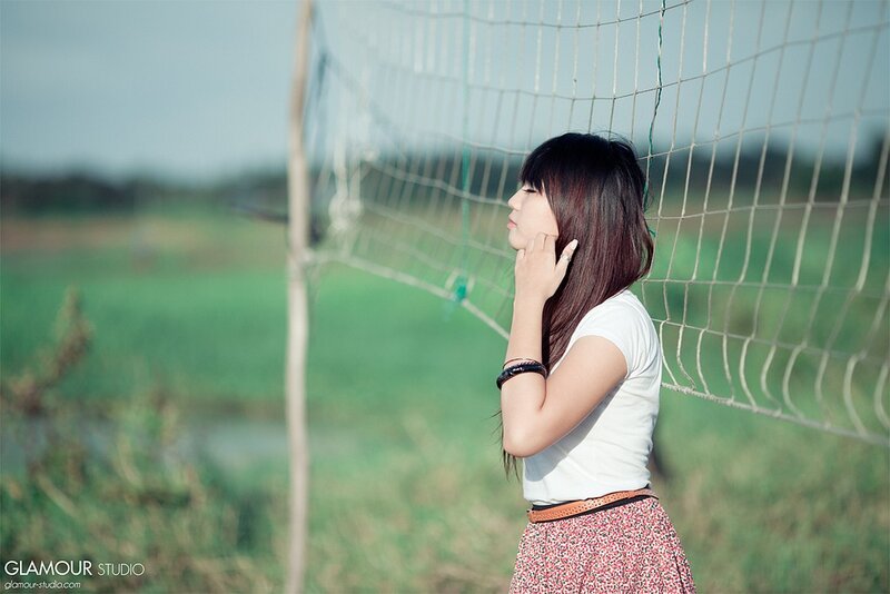 woman standing by net