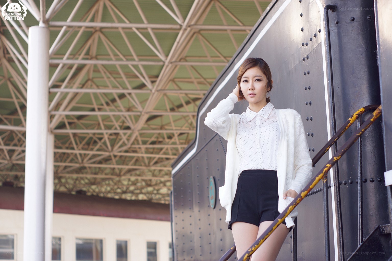 woman standing by train car