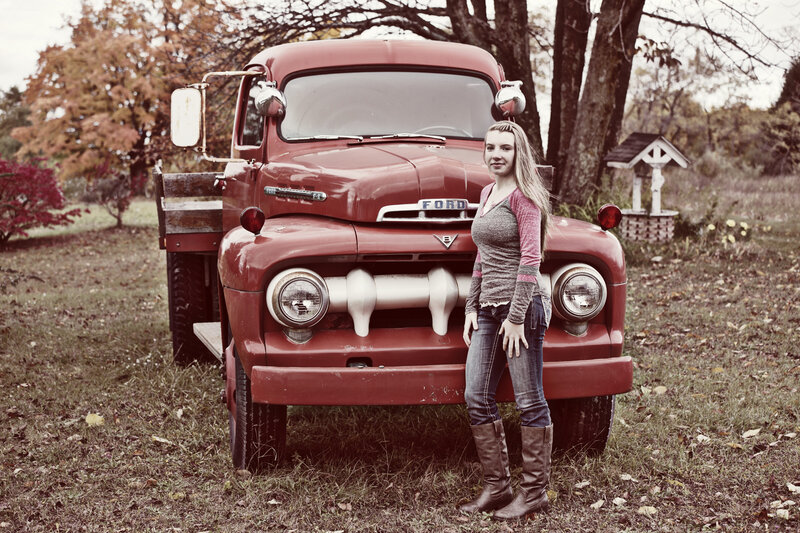 Woman Standing by Truck — Red