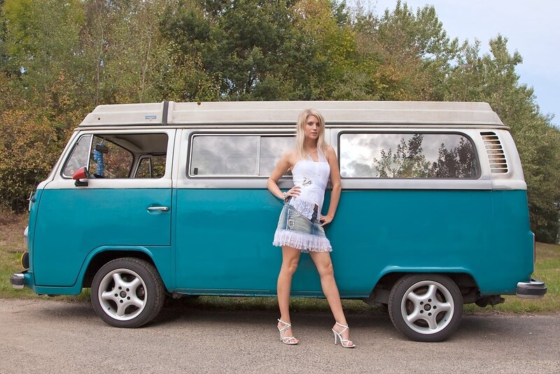 Woman Standing by Van
