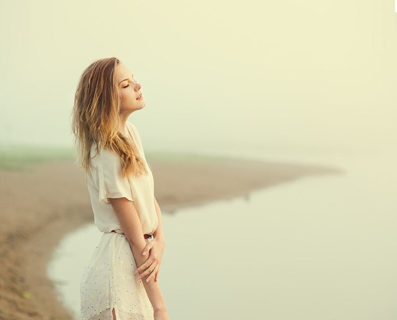 Woman Standing by Water — Beige