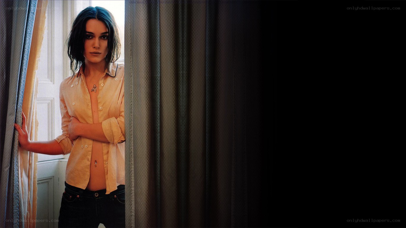 woman standing by window