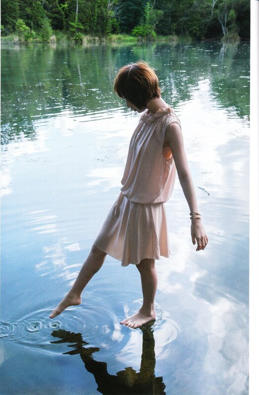woman standing in a lake