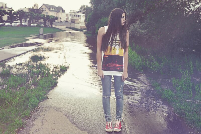 woman standing in a puddle