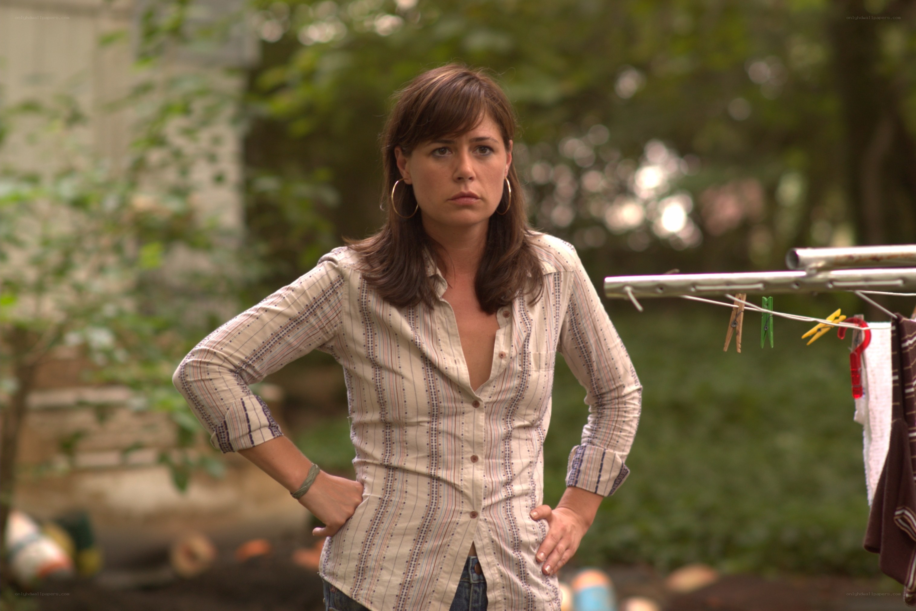 woman standing in backyard