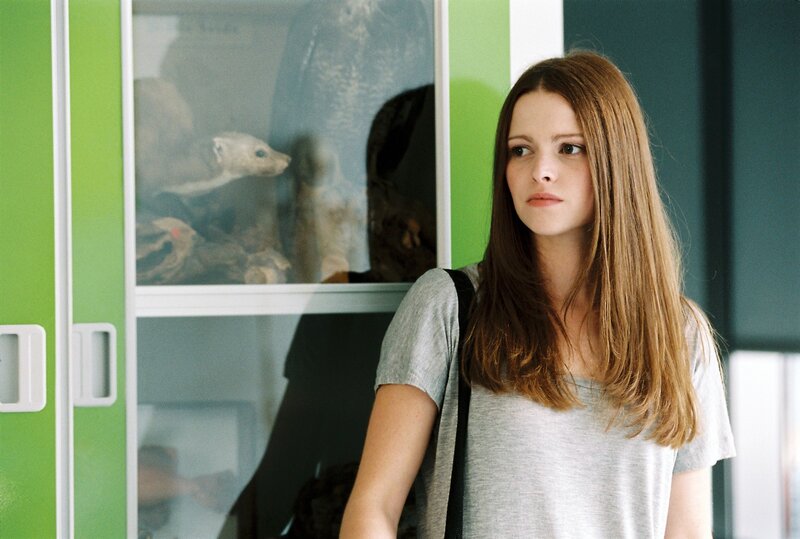 woman standing in hallway