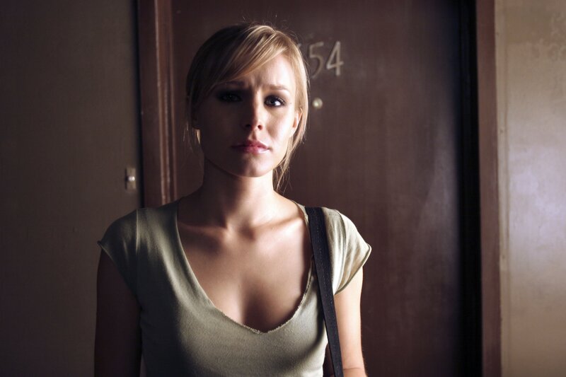 woman standing in hallway