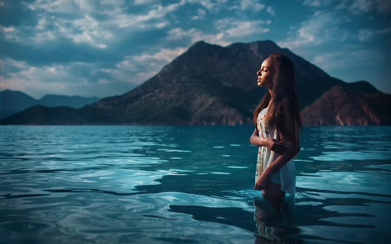 Woman Standing in Water — Blue