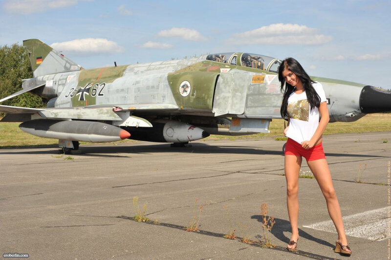 Woman Standing Near Jet