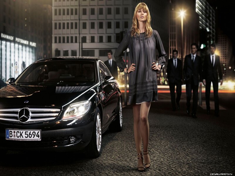 Woman Standing Next to Car — Black, Dramatic
