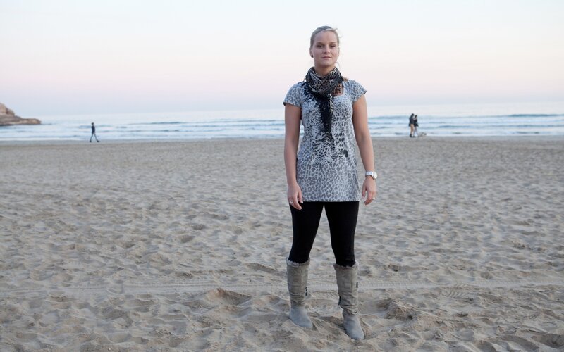Woman standing on a beach